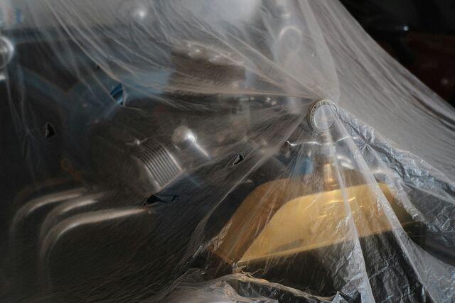 An accidental frame of a plastic-covered chair, nobody in it