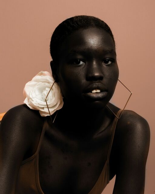 A portrait with a rose